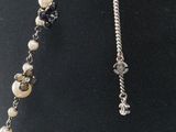 a close up of a necklace on a mannequin mannequin mannequin mannequin mannequin mannequin mannequin mannequin
