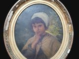 tableau représentant une jeune fille coiffée d'un bonnet blanc, dans un cadre doré