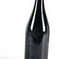 a bottle of wine that is sitting on a table