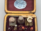 a small box with a variety of items inside of it