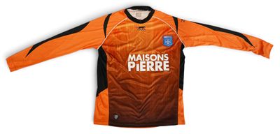 an orange and black soccer jersey with the words madison ' s pierre written on it