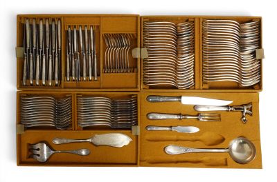 a wooden box with silverware in it on a white background