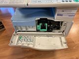 a printer that is sitting on top of a desk
