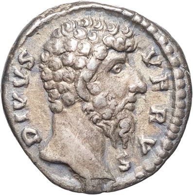 pièce de monnaie en argent portant l'image d'une tête d'homme