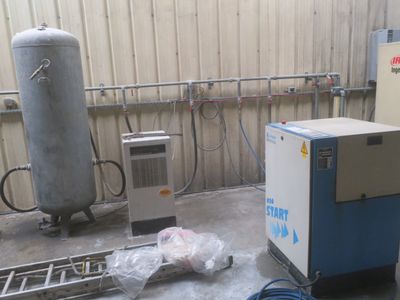 an image of a room with a water heater and other equipment