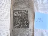 un vieux livre avec l'image d'un homme dessus