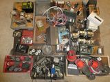 a lot of assorted electronic equipment on the floor