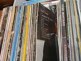 a white box filled with a lot of vinyl records