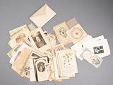 many cards and envelopes laid out on the table