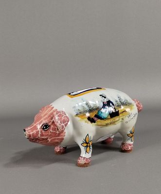 une image représentant une figurine de cochon posée sur une surface grise