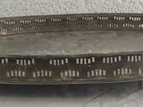 a metal tray that is sitting on a table
