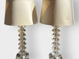 pair of crystal table lamps with shades on each of them