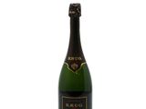 a close up of a bottle of champagne on a white background