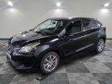 a picture of a black car parked in a garage