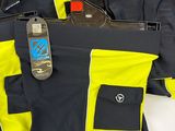 a bag with a cell phone in it and some other items