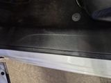 a close up of a car door handle and the door handle is missing