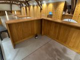 an image of a large room with a wooden counter