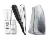 the contents of a hair care kit include a hair straighten, a bag, and a hair brush