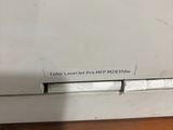 a close up of a white refrigerator with a black handle