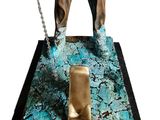 statue of a man with a chain on his neck standing on a toilet