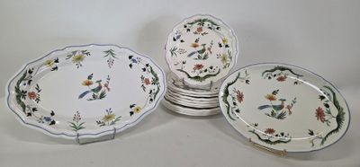 several plates are stacked on top of each other on a table