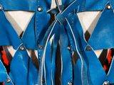 a close up of a blue and white corset