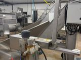 an image of a machine that is working in a factory