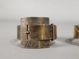 pair of antique silver and copper cuff bracelets with engraved names