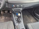 a picture of a car dashboard with a gear stick