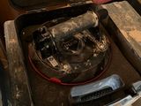 a suitcase that is sitting on top of a stove