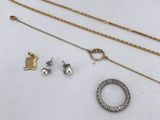 a collection of jewellery including a necklace, bracelet and ring