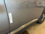 a close up of a car with a sticker on it