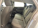 the back seats of a silver car are clean and ready to be used