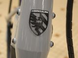 a close up of a bike handle with a sticker on it