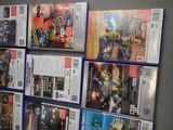a lot of video games on display on the wall