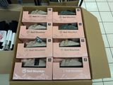 six boxes of shoes in a box on the floor