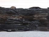 a black plastic case that is sitting on the floor