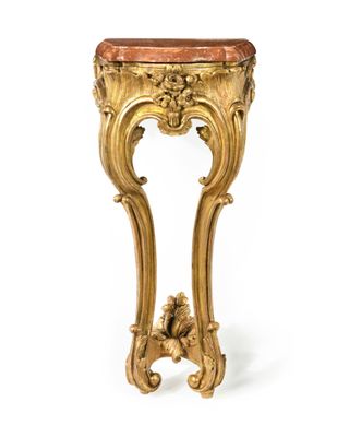 a gold console table with a marble top on a white background