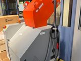 a machine that is sitting on a cart in a room
