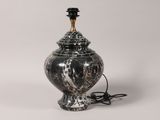 black and white marbled urn lamp with a black shade