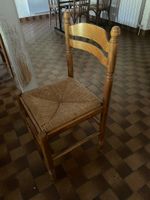 21 chaises en bois paillées
