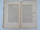 an open book on a table with a white background