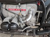 a close up of a motorcycle with a motorbike attached to it