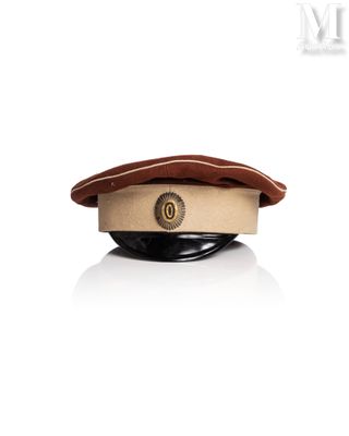 a close up of a hat on a white surface