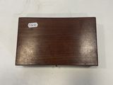 an image of a piece of wood with a sticker on it