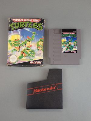 an image of a nintendo game with a box of teenage mutant turtles