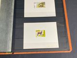 a picture of a folder with stamps on it