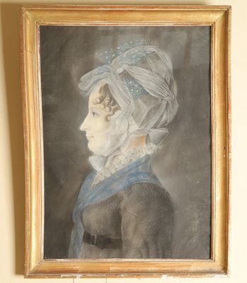 tableau représentant une femme portant un turban et une robe bleue
