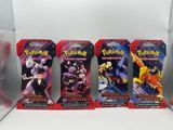 three packs of pokemon trading cards on display in a display case