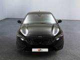 an image of a black car in a showroom